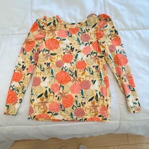Tea Collection Floral Print Top with hints of blue and shades of orange Accents